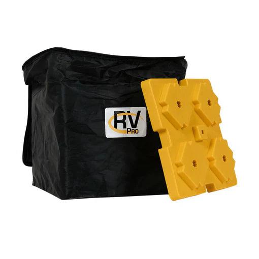 Set of 10 interlocking yellow RV leveling blocks with carrying bag, model RVP140065, used for stabilizing and leveling RVs on uneven ground